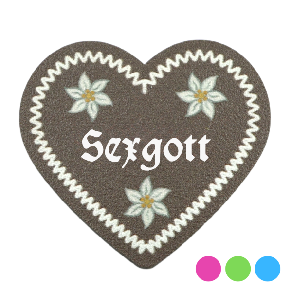 "Sexgott-Anstecker in Lebkuchen-Optik - erhältlich bei Glubbal.shop"